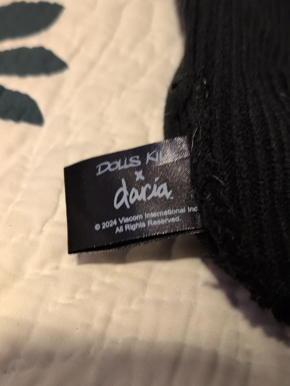 Dolls Kill Black Ribbed Beanie with Daria Tag